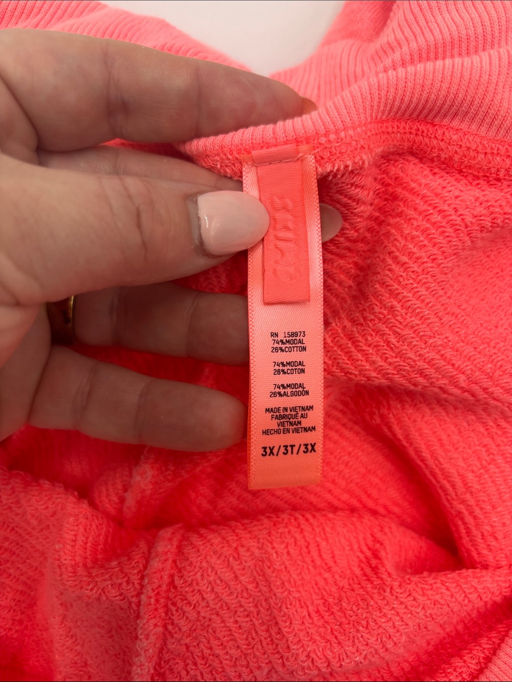 SKIMS Modal French Terry Flare Pants in Coral - Picture 6 of 6